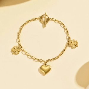 Bracelet coeur et trèfle en acier doré avec un fermoir à bascule OT design et sécurisé