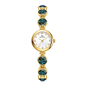 Elegant gold vintage watch for women featuring malachite green stones and pearl dial