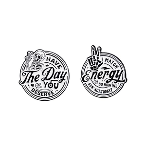 Skeleton enamel pins set featuring HAVE THE DAY YOU DESERVE and MATCH ENERGY typography