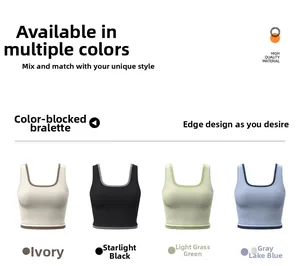 Detail showing high-stretch yoga bras in ivory, black, green, and blue with contrast trim