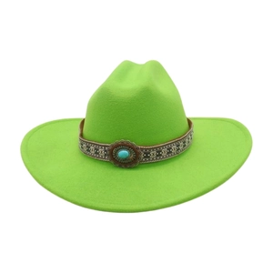 Detail of bright green felt cowboy hat featuring a vintage turquoise stone hatband