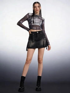 Women's black cargo denim skirt with large pockets and a grey graphic mesh top