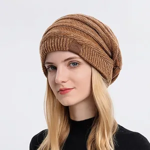 Caramel knit beanie for men and women with leather patch in a slouchy autumn style