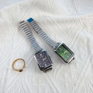 Elegant ladies' square quartz watches with green and black dials on metal bamboo bands