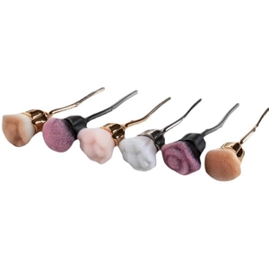 Elegant rose-shaped makeup brushes with soft gradient bristles and slim metallic stems