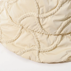 Unisex cream puffer bucket hat with high-quality quilted texture for winter warmth