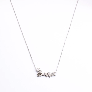 Detail of silver stainless steel Sophia name necklace with gothic font and fine chain