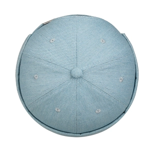 Light blue denim docker cap with classic six-panel design and embroidered eyelets