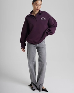 Detailed full-body view of purple polo collar sweatshirt with SOHO HOUSE white print