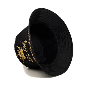 Black canvas bucket hat with golden crown print and birthday slogan for sun protection