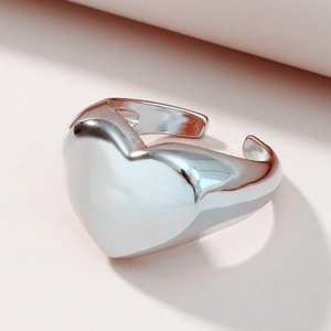Minimalist silver open heart ring with a 3D heart design and polished mirror finish