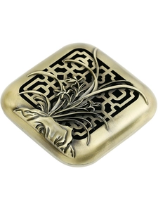 Close-up of bronze alloy incense burner lid with hollowed pattern and orchid relief
