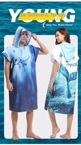 Detail of microfiber surf poncho featuring digital printing and windproof hood