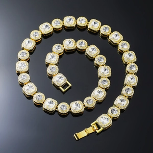 Macro shot of 12mm gold plated hip hop chain with square cubic zirconia and fold-over clasp
