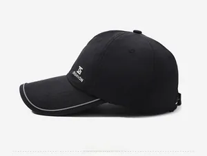 Side view of black quick-dry baseball cap featuring FASHION logo and reflective brim trim