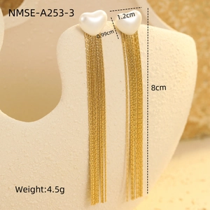 Detail of gold chain tassel earrings with white heart top showing size and 4.5g weight
