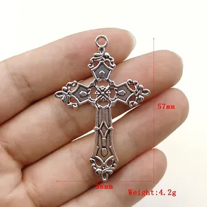 Vintage silver hollow-out cross pendant with vine patterns and detailed size measurements