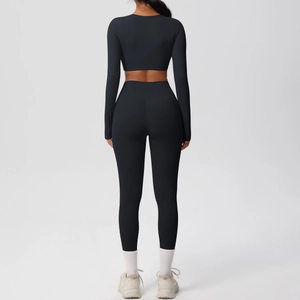 Back view of black high-waist yoga set with long sleeve crop top and leggings