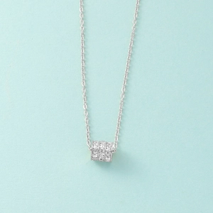 Three-layer diamond cylinder pendant necklace in titanium steel on light blue background