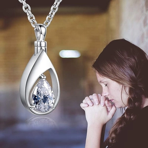 Elegant teardrop urn necklace with pear-cut zircon stone for memorial jewelry