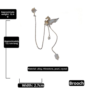Detail showing dimensions of vintage Pegasus brooch with rhinestones and tassels