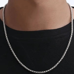 Men's hip hop silver stainless steel chain necklace set worn on a black shirt