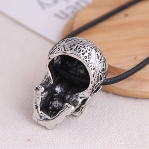 Vintage silver skull pendant necklace with black woven cord for men's fashion