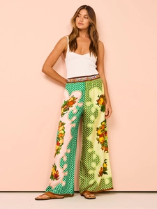 Full view of women's summer set with white camisole and colorful fruit print wide leg pants