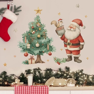Watercolor Christmas wall stickers featuring Santa, a festive tree, and stars on a beige wall