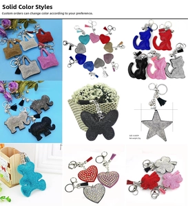 Various crystal rhinestone keychains with colorful tassels in animal and heart shapes