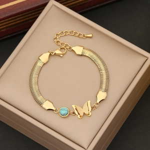 Bracelet bohème en acier inoxydable doré avec papillon mat et perle bleue vintage