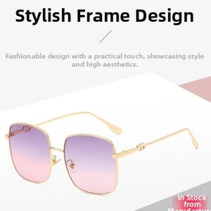 Detail of gold metal frames with purple gradient lenses and chic temple metal hardware