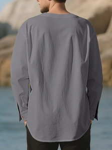 Outdoor back view of men's dark grey cotton linen long sleeve shirt with textured fabric