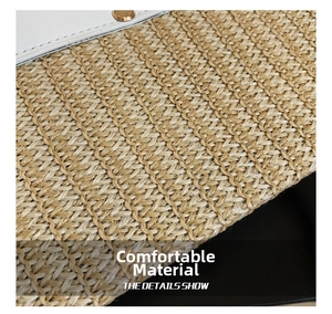 Macro shot of beige woven straw texture with white leather trim and gold metal clasp detail