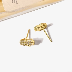 Hamsa Hand gold stud earrings with clear zircon crystals on white background