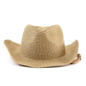Detail of straw cowboy hat with metallic glitter thread and adjustable chin strap