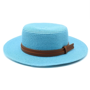 Detailed view of sky blue straw hat weave with brown leather belt and square buckle