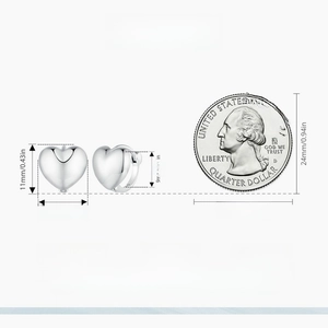 Detailed size comparison of S925 sterling silver heart hoop earrings with a quarter coin