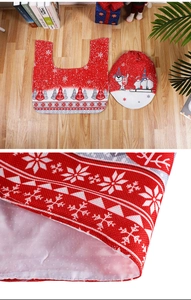Detail of Christmas toilet cover and U-shaped mat with gnome prints and anti-slip backing