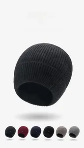 Detailed view of six color options for ribbed knit winter beanies with metal sport logo