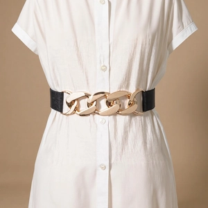 Fashionable black elastic waist belt for women with a large interlocking gold chain buckle