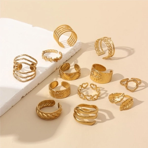 11-piece set of 18k gold plated open rings with snake, heart and bohemian geometric designs