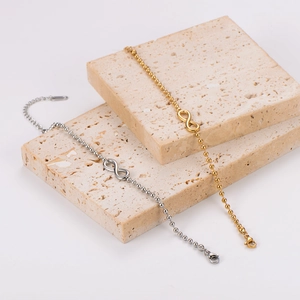 Minimalist infinity symbol bead chain bracelet in gold and silver metal finishes