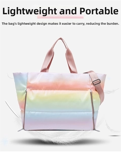 Close-up of lightweight rainbow gradient quilted travel bag with soft nylon texture