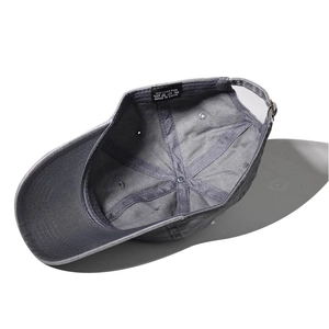 Detail of grey washed cotton baseball cap showing inner sweatband and metal buckle