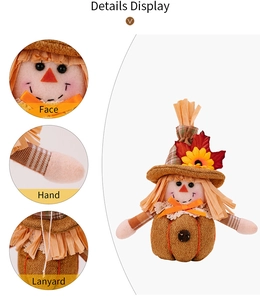 Detail view of harvest gnome with sunflower, maple leaf and burlap pumpkin textures