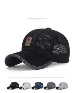 Detail der atmungsaktiven Mesh-Baseballkappe mit Leder-Logo-Patch und grauem Paspel