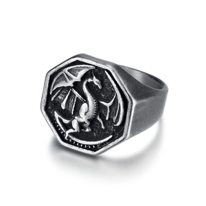 Vintage stainless steel signet ring with detailed dragon relief in silver and black finish