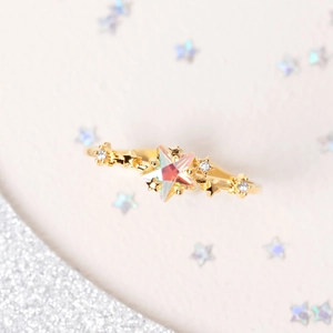 Golden star open ring with iridescent gemstone and micro-pave crystal accents