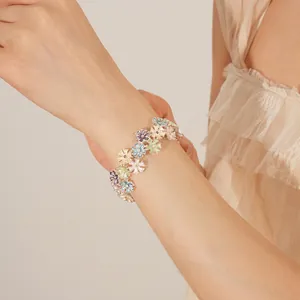 Charming enamel flower elastic bracelet with colorful petals and small rhinestones